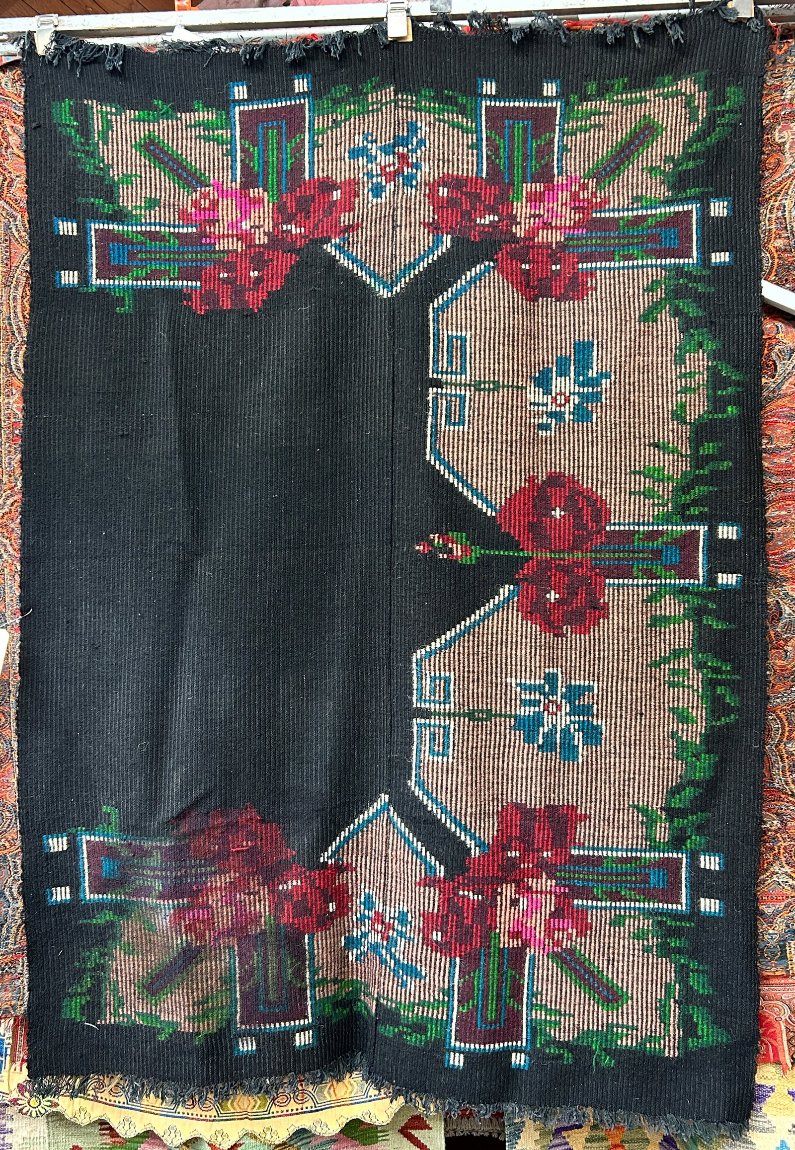4' 2" x 5' 10" Wool Handmade Blanket.: The blanket has floral and house designs. It looks to be in good overall condition. In-house shipping is available. To receive the best shipping rate on this item, please check the "Self Arranged" but