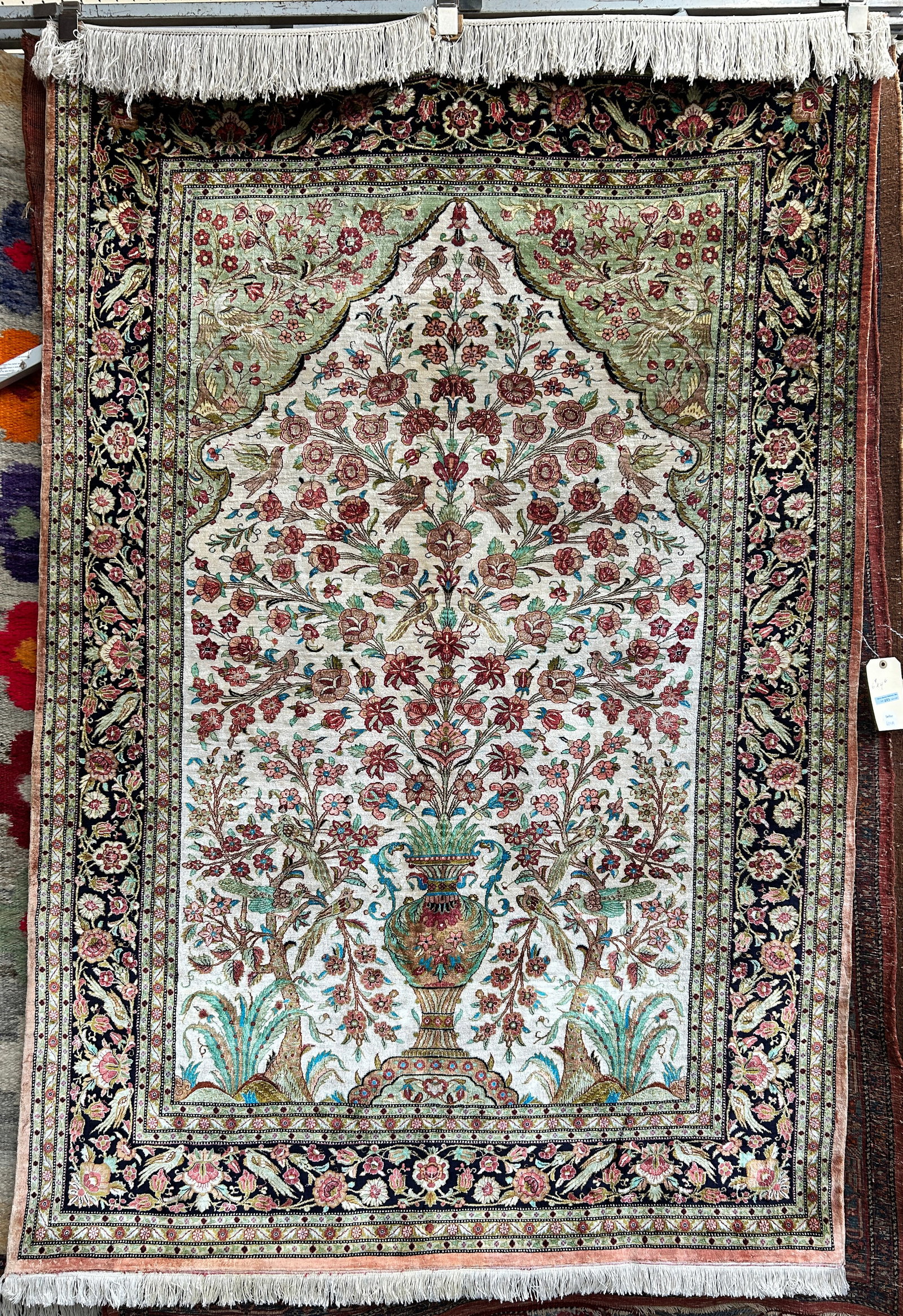 4' 6" x 6' 9" All Silk Tree of Life Qum Rug.: This finely woven rug is in very good overall condition. In-house shipping is available. To receive the best shipping rate on this item, please check the "Self Arranged" button at checkout. Our in-hou