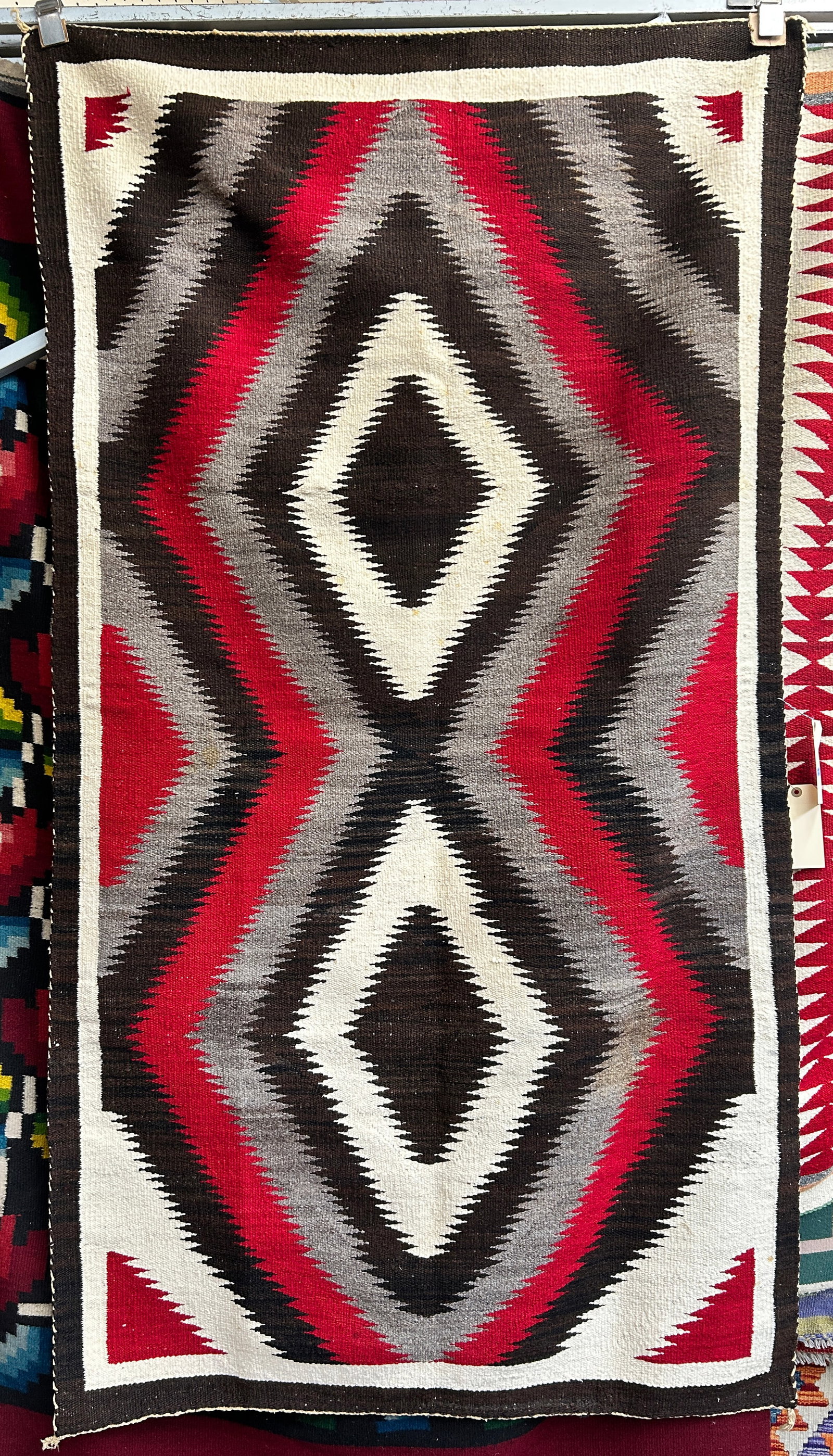 3' 6" x 6' 5" Vintage Eye Dazzler Navajo Rug. (1 of 2)
