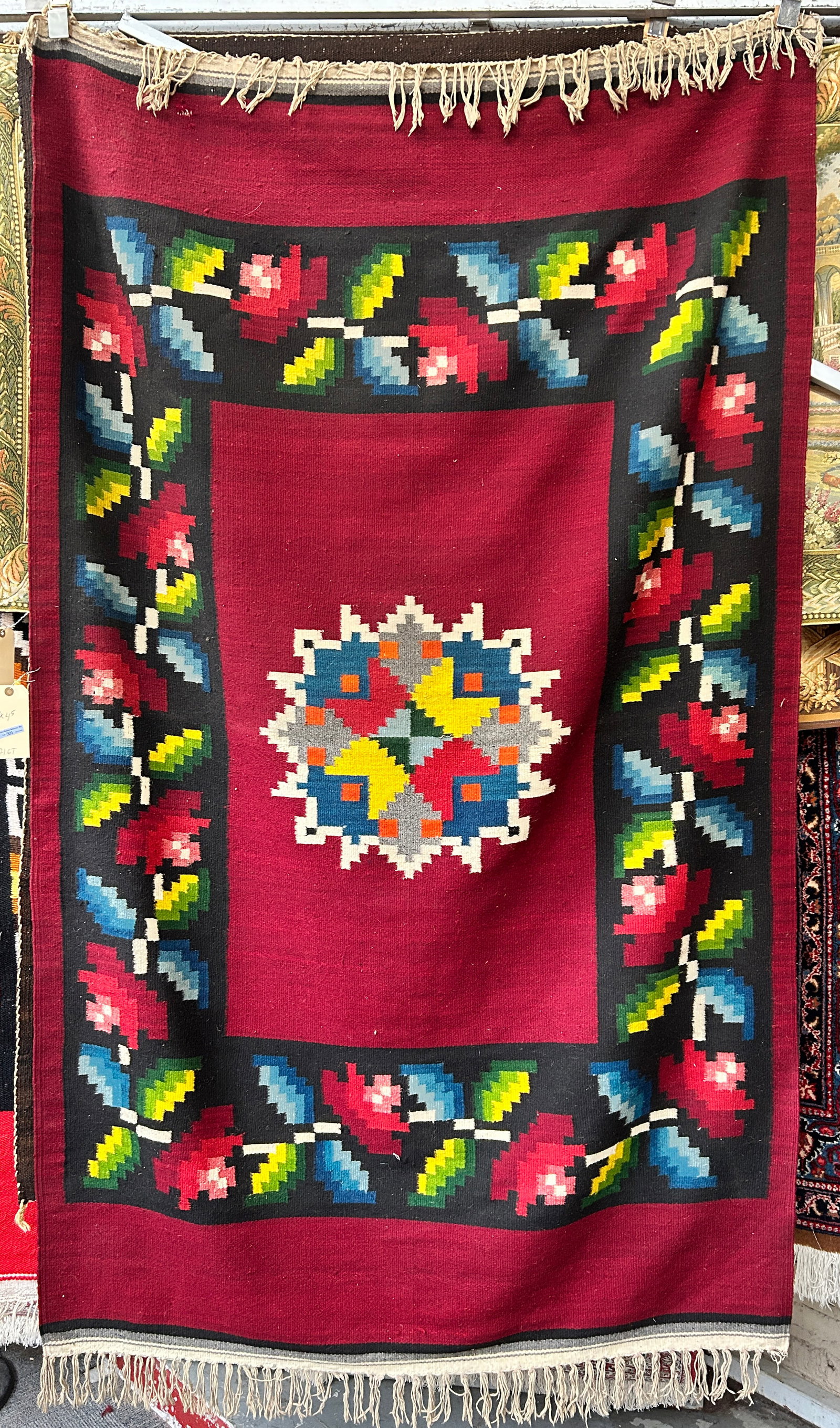 4' 5" x 7' 3" Southwest Style Flatweave Rug.: This rug has a couple of small holes and a couple of 1" or less small shredded areas in the weave. Otherwise, it is in good overall condition. In-house shipping is available. To receive the best shipp