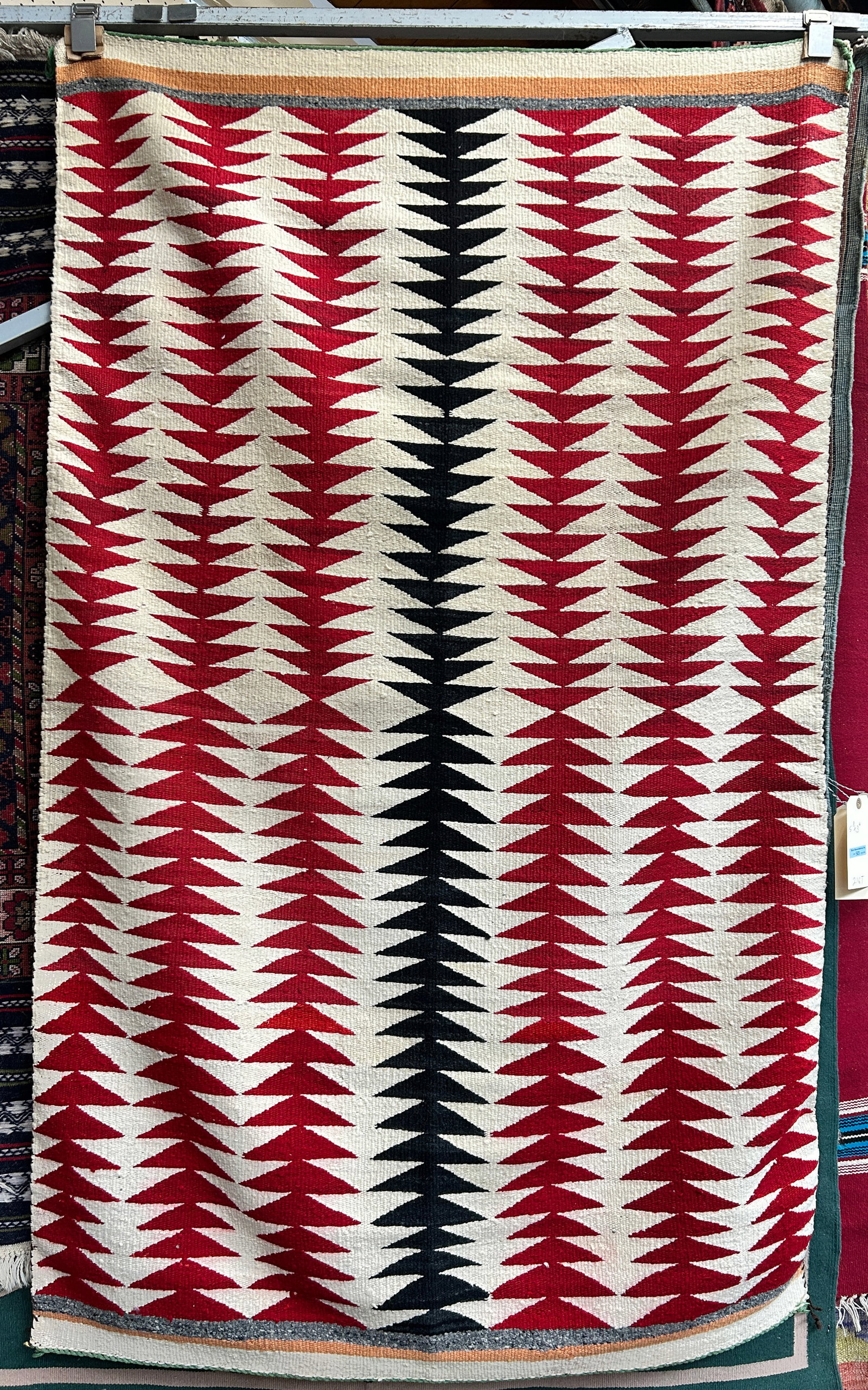 3' 6" x 5' 8" Vintage Navajo Eye Dazzler Rug.: The rug looks to be in good condition for its age. In-house shipping is available. To receive the best shipping rate on this item, please check the "Self Arranged" button at checkout. Our in-house shi