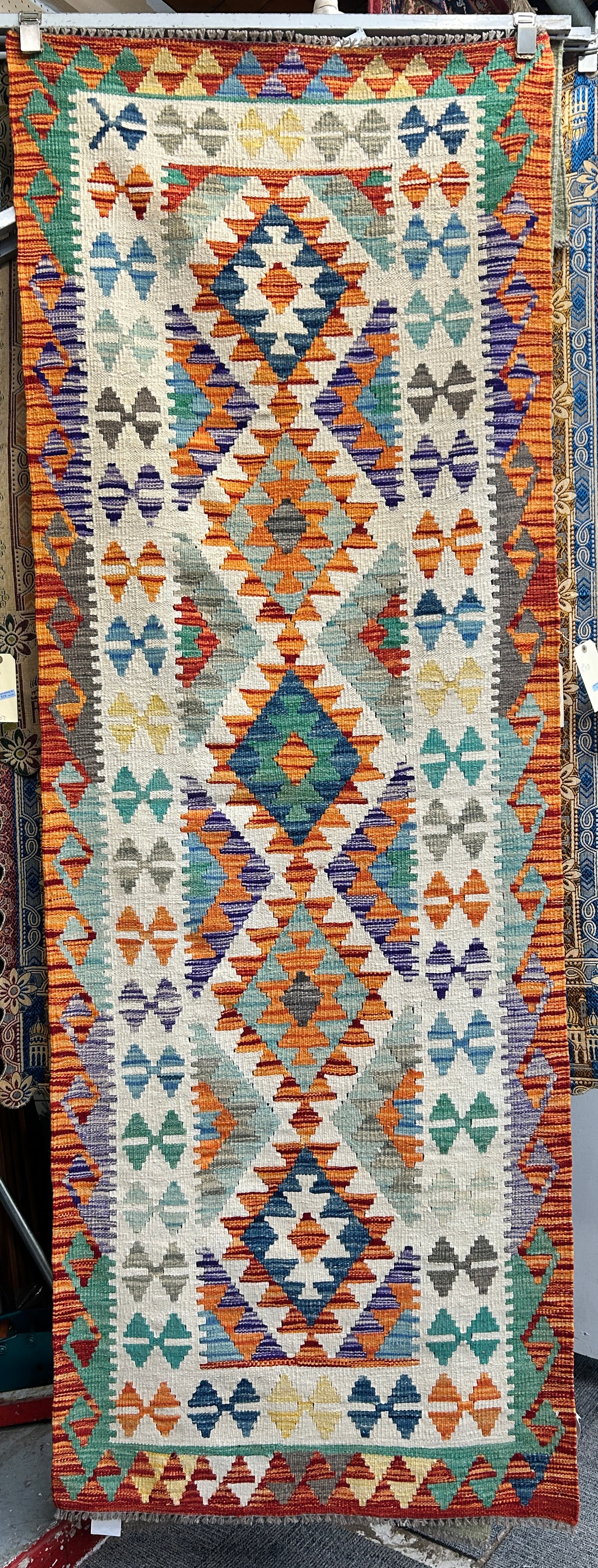 3' x 8' 6" Colorful Kelim Runner Rug.: The rug is in very good condition. In-house shipping is available. To receive the best shipping rate on this item, please check the "Self Arranged" button at checkout. Our in-house shipping department