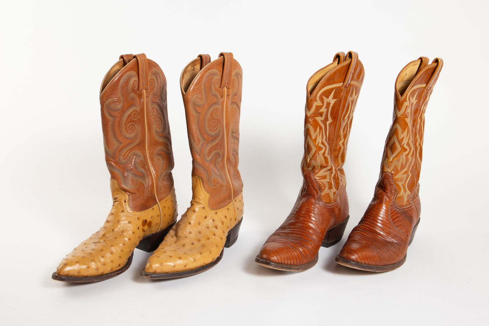 Lot: 2 Pairs of Tony Lama Leather Boots, Size 7.: The cowboy boots look to be in overall good condition. Each one measures approximately 11" x 4 1/4 x 14". In-house shipping is available. To receive the best shipping rate on this item, please check