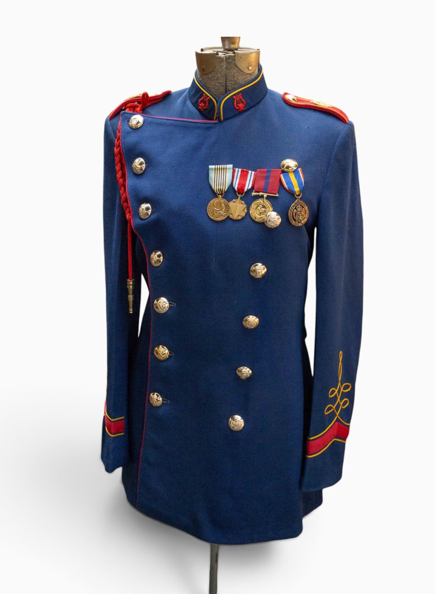 Vintage Acme Dress Form w/ Music Corps Tunic.: The military band tunic coat is made by Craddock Uniforms. It is decorated with medals. Overall, it looks to be in good condition, though the buttons are held up with safety pins. It measures 18 1/2" 