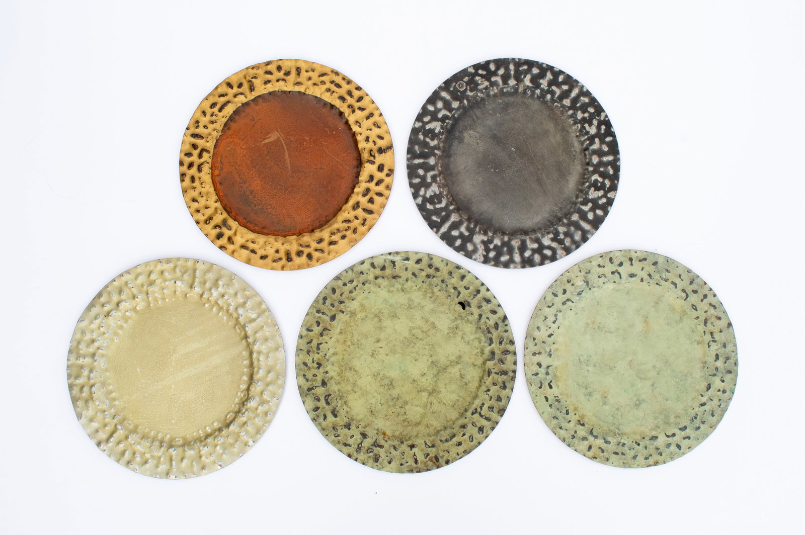 Lot of 5 Jan Barboglio 14" Hammered Chargers.: Four of them are signed on the back, and one of them is signed on the front. They have some scratches, and could use a cleaning. They measure 14" x 14" x 1/16". In-house shipping is available. To rece