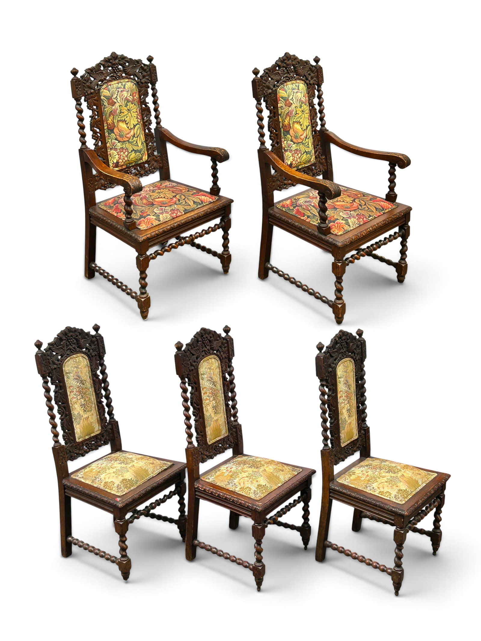5 Renaissance Revival Carved Barley Twist Chairs.: The lot is composed of 3 side chairs and 2 arm chairs with matching carvings. The carvings feature pediments depicting a couple of birds flanking a grape bunch, barley twist sides, posts, and