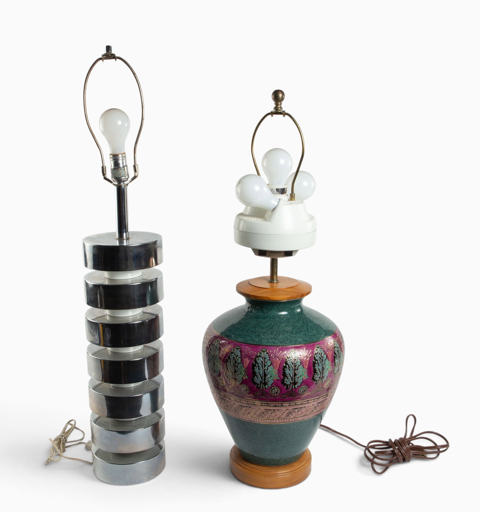 Lot of 2 Lamps- Vintage Metal, Ceramic Vase.: The taller lamp is made up of metal discs, and measures 6 1/4" x 6 1/4" x 34 1/2". The shorter Microsun lamp resembles a bulbous vase with Acanthus leaves. It measures 11" x 11" x 31 1/2". In-house sh