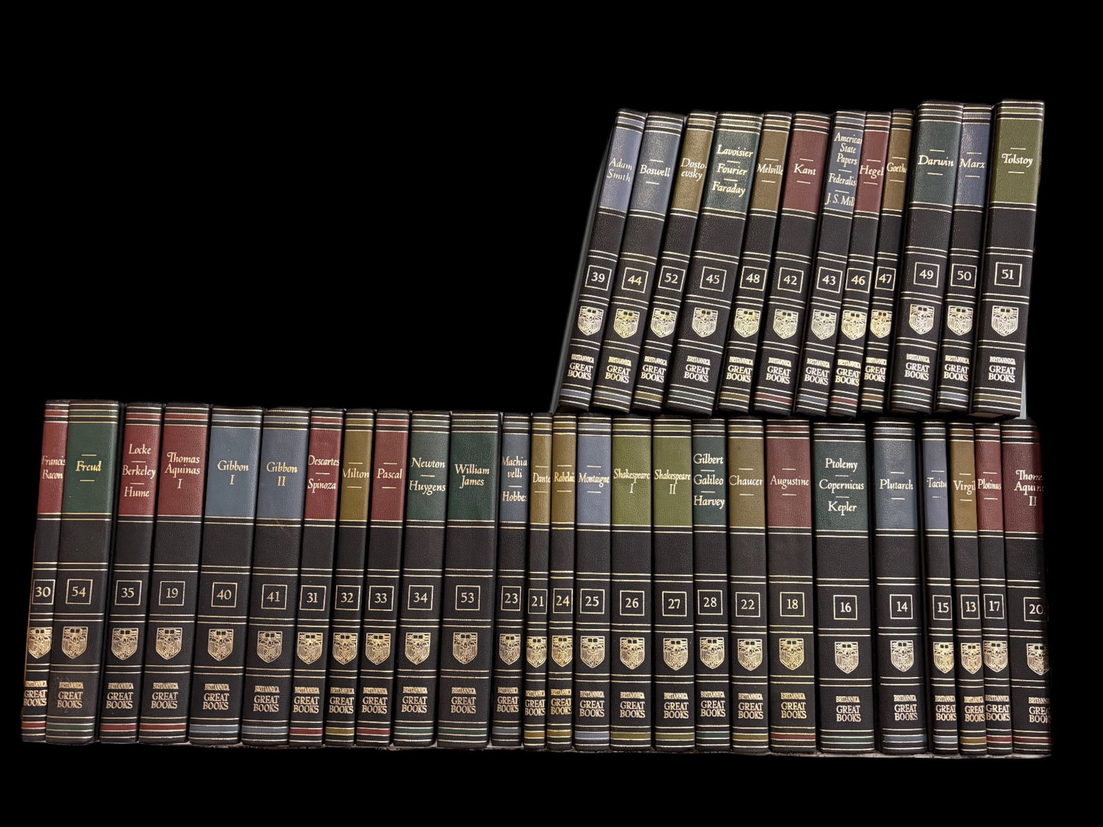 38 Volume Lot of Britannica Great Books.: This lot includes books on Freud, Darwin, Shakespeare, Tolstoy, Dante, Milton, and more. It is not a complete set. The largest book measures 9 3/8" x 6 3/8" x 1 1/2". The smallest book measures 9 3/8"