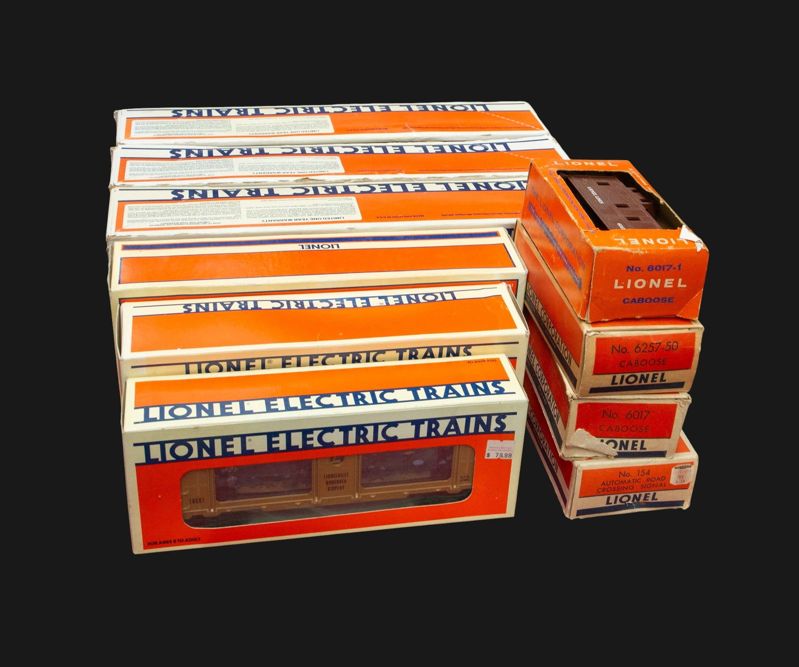 Lot of Lionel Model Trains w/ Original Boxes.: Included are the following: Animated Aquarium Car, New York Central Bay Window Caboose, AEC Reactor Fluid Tank Car, New York Central Observation Car 6-9598, New York Central Baggage Car 6-9594, New Yo