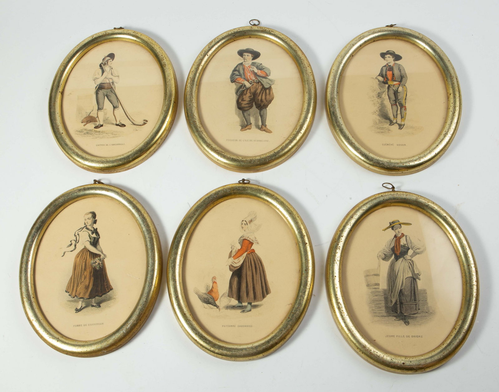 Set of 6 Borghese Framed Prints of European People: This set includes "Femme de Goppingen", "Jeune Fille de Brienz", "Paysanne Cochoise", "Laitier de L'Oberhasli", "Pecheur de L'Ile de Schokland", and "Guemene Rohan". Each frame measures 11 1/2" x 9
