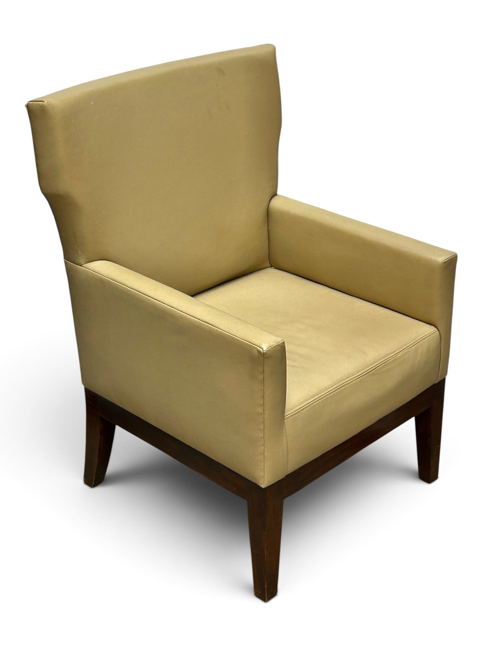 Christian Liaigre Style Beige Leather Arm Chair.: The chair is in the style of Christian Liaigre for Holly Hunt. The piece measures 40 3/4" tall, 30" wide, and 30 1/2" deep. There are some scratches and nicks on the leather, mostly on the backrest