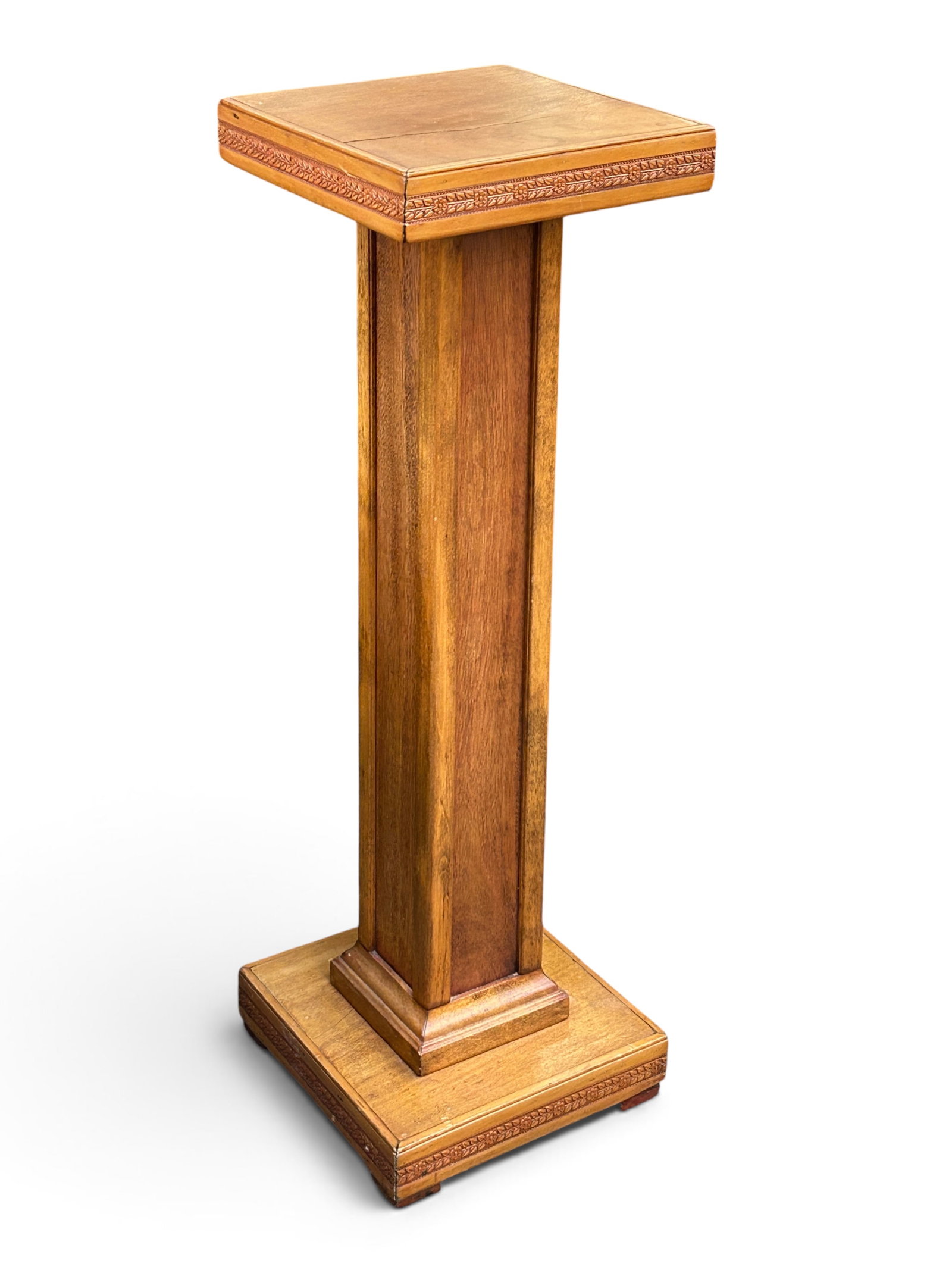 Oak Wood Pedestal.: This pedestal or plant stand has a carved border and a square base. The top has an age crack. Otherwise, it is in good condition. The piece measures 40" tall, with a 12 1/2" x 12 1/2" top. Third