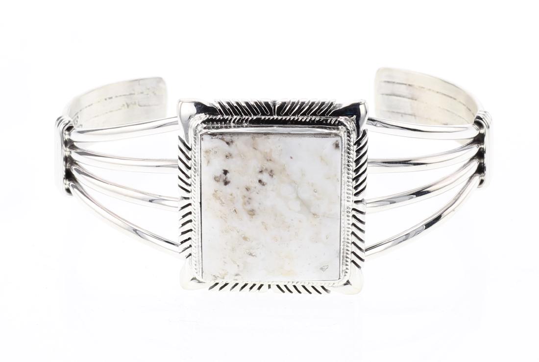 Larry Spencer White Buffalo Contemporary Cuff Bracelet: Sterling Silver | Genuine White Buffalo | Larry Spencer White Buffalo Contemporary Cuff Bracelet | Navajo Native American Southwest Indian Jewelry | Dimensions: Bracelet: 5.75" inner, 1.25" gap, 7" to