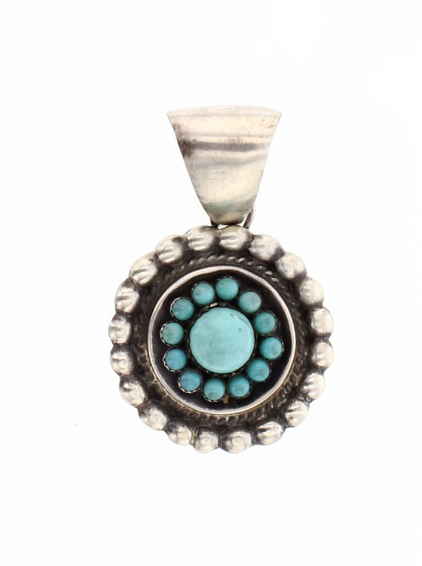 Harley Jake Turquoise Flower Blossom Pendant: Sterling Silver | Genuine Turquoise | Harley Jake Turquoise Flower Blossom Pendant | Navajo Native American Southwest Indian Jewelry | Weight:14.6 Grams, | Dimensions: Pendent: 1.25" x 2", 9mm diamete