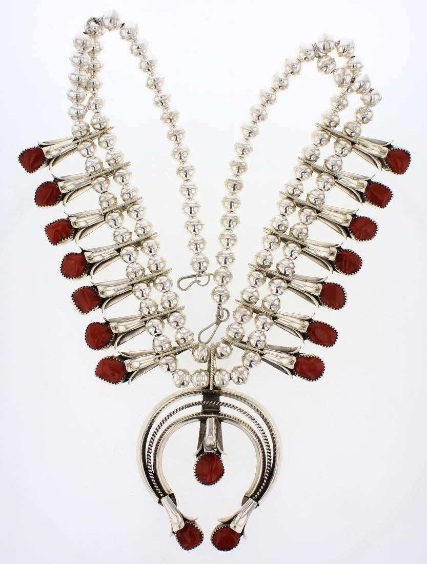 Dons Small Canyon Ox Blood Coral Squash Blossom: Sterling Silver | Genuine Coral | Dons Small Canyon Ox Blood Coral Squash Blossom Necklace | Navajo Native American Southwest Indian Jewelry | Weight:120.4 Grams, | Dimensions: Necklace: 22" length, 2
