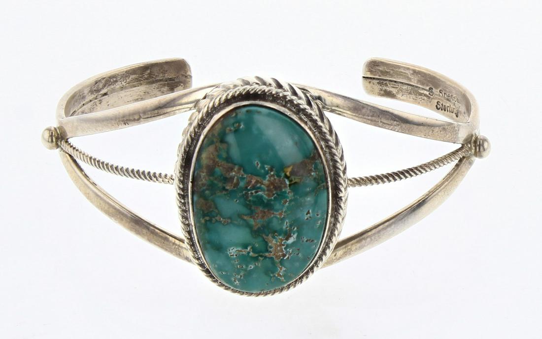 Larry Spencer Blue Gem Turquoise Bracelet: Sterling Silver | Genuine Blue Gem | Larry Spencer Blue Gem Turquoise Bracelet | Navajo Native American Southwest Indian Jewelry | Weight:34.9 Grams, | Dimensions: Bracelet: 5.75" inner, 1" gap, 6.75"