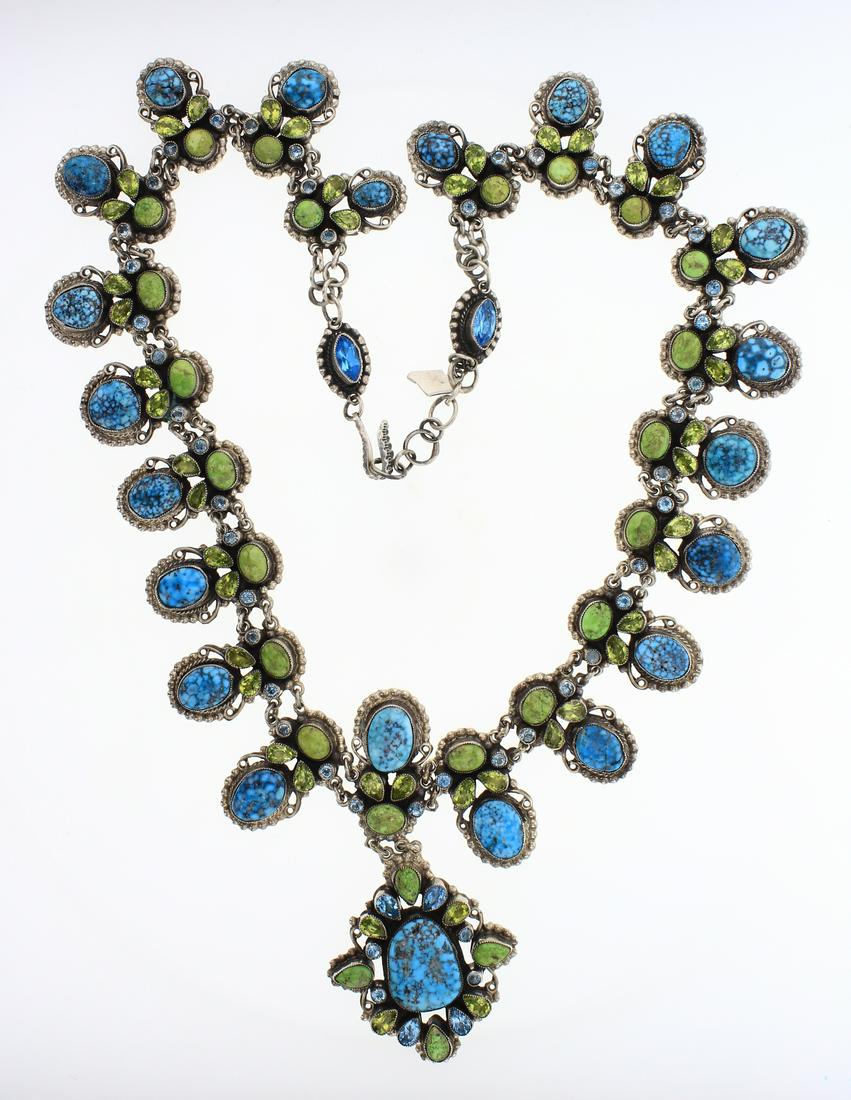Leo Feeney Spiderweb Kingman Turquoise Gaspeite Peridot: Sterling Silver | Genuine Gaspeite, Spiderweb Kingman Turquoise, Blue Topaz, Green Peridot | Leo Feeney Spiderweb Kingman Turquoise Gaspeite Peridot & Blue Topaz Necklace | Anglo Southwest American Ar