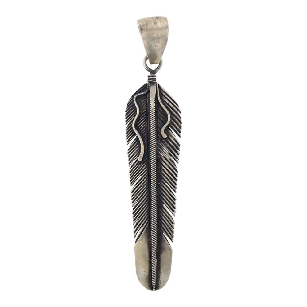 Ernest Bilagody Feather Pendant: Sterling Silver | | Ernest Bilagody Feather Pendant | Navajo Native American Southwest Indian Jewelry | Weight:18.8 Grams, | Dimensions: Pendant: 1" x 4 1/2" | Signed: ETB Sr. | Free Expedited Insured