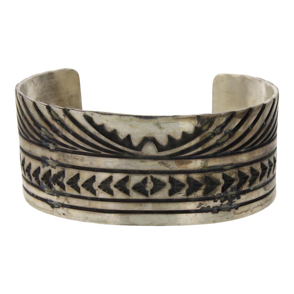 Rick Enriquez Navajo Stamp Cuff Bracelet: Sterling Silver | | Rick Enriquez Navajo Stamp Cuff Bracelet | Navajo Native American Southwest Indian Jewelry | Weight:60.1 Grams, | Dimensions: Bracelet: 6" inner, 1.25" gap, 7.25" total, 1" face wi