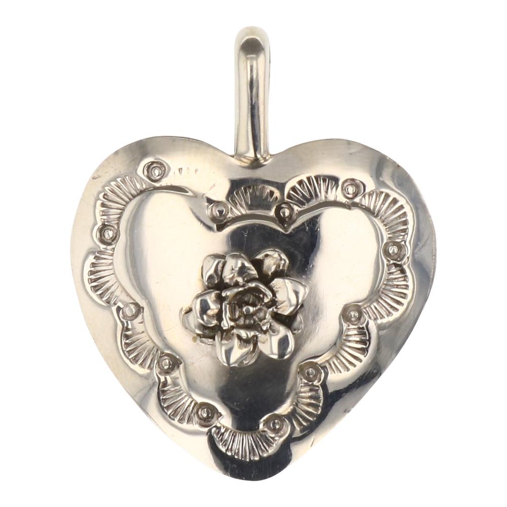 John Nelson Plain Silver Heart Pendant: Sterling Silver | | John Nelson Plain Silver Heart Pendant | Navajo Native American Southwest Indian Jewelry | Approx. Weight:5 Grams, | Dimensions: Pendant: 1" x 1.25" | Signed: J Nelson