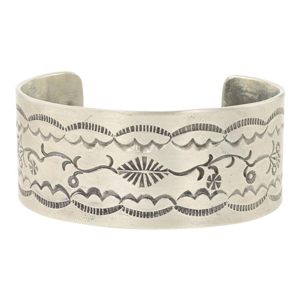 Navajo Plain Silver Stamp Cuff Bracelet: Sterling Silver | | Navajo Plain Silver Stamp Cuff Bracelet | Navajo Native American Southwest Indian Jewelry | Approximate Weight: 72 Grams | Dimensions: Bracelet: 6" inner, 1" gap, 7" total, 1.25" f