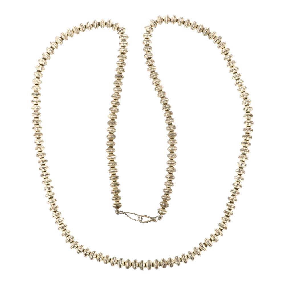 Navajo Bench Saucer Beads Necklace: Sterling Silver | | Navajo Bench Saucer Beads Necklace | Navajo Native American Southwest Indian Jewelry | Approximate Weight: 64 Grams | Dimensions: Necklace: 28" length, .25" face width |