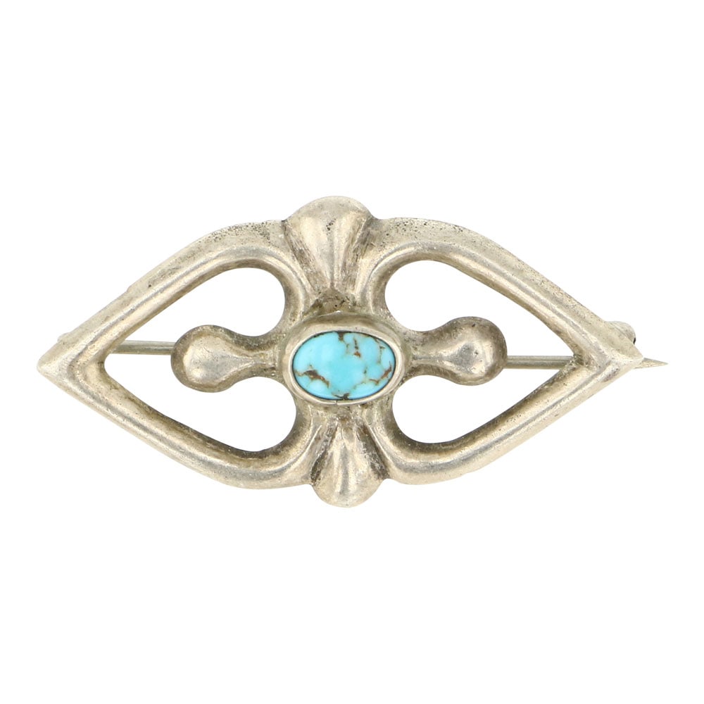 Vintage Navajo Sandcast Nevada Turquoise Pin: Sterling Silver | Genuine Nevada Turquoise | Vintage Navajo Sandcast Nevada Turquoise Pin | Navajo Native American Southwest Indian Jewelry | Approximate Weight: 5 Grams | Dimensions: Pin: .75" x 1.5"
