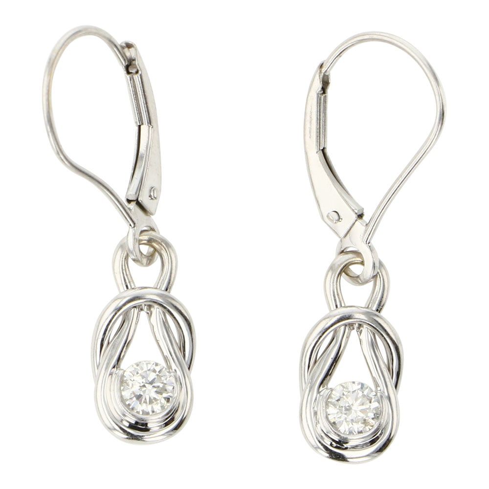 14K White Gold Round Brilliant Diamond earrings: 14K Gold | Genuine Natural Diamonds | 14K White Gold Round Brilliant Diamond earrings | | Approximate Weight: 2.3 Grams | Total Diamond Carat Weight: 0.24 Ct. | | Curated estate fine gold jewelry coll