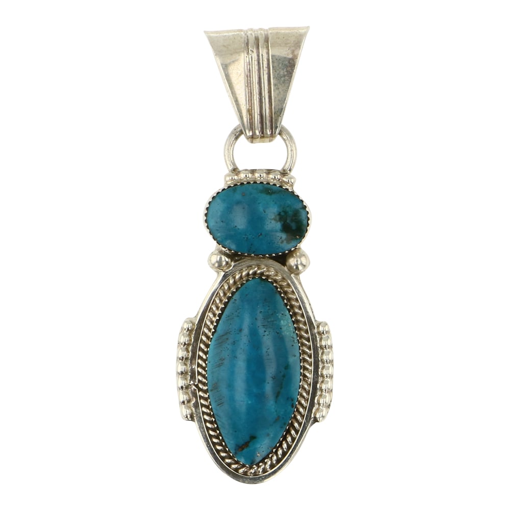 RB Navajo Nacozari Turquoise Pendant: Sterling Silver | Genuine Nacozari Turquoise | RB Navajo Nacozari Turquoise Pendant | Navajo Native American Southwest Indian Jewelry | Approximate Weight: 16 Grams | Dimensions: Pendant: 1.5" x 2.75"