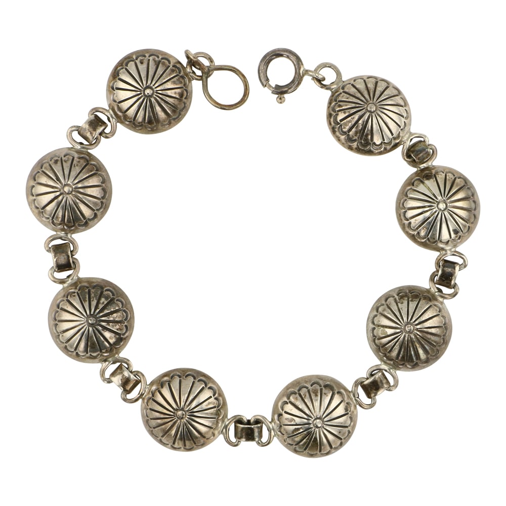 Vintage Sterling Silver Stamp Link Bracelet: Sterling Silver | | Vintage Sterling Silver Stamp Link Bracelet | Navajo Native American Southwest Indian Jewelry | Approximate Weight: 18 Grams | Dimensions: Bracelet: 8" length, .5" face width |