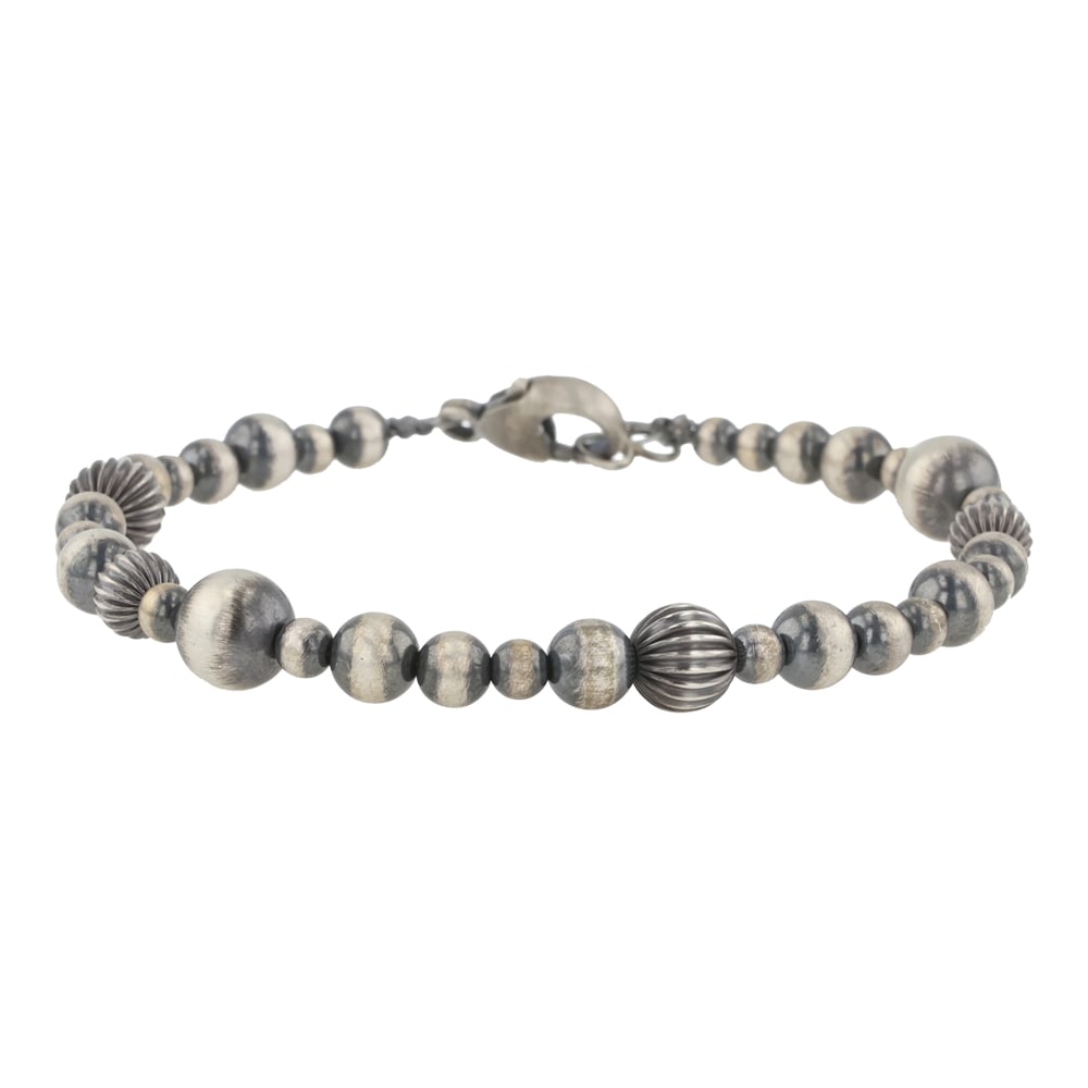 Oxidized Sterling Silver Mixed Sized Beads Bracelet: Sterling Silver | | Oxidized Sterling Silver Mixed Sized Beads Bracelet | Navajo Native American Southwest Indian Jewelry | Good (no breaks or damages) | Approximate Weight: 7 Grams | Bracelet: 8" len