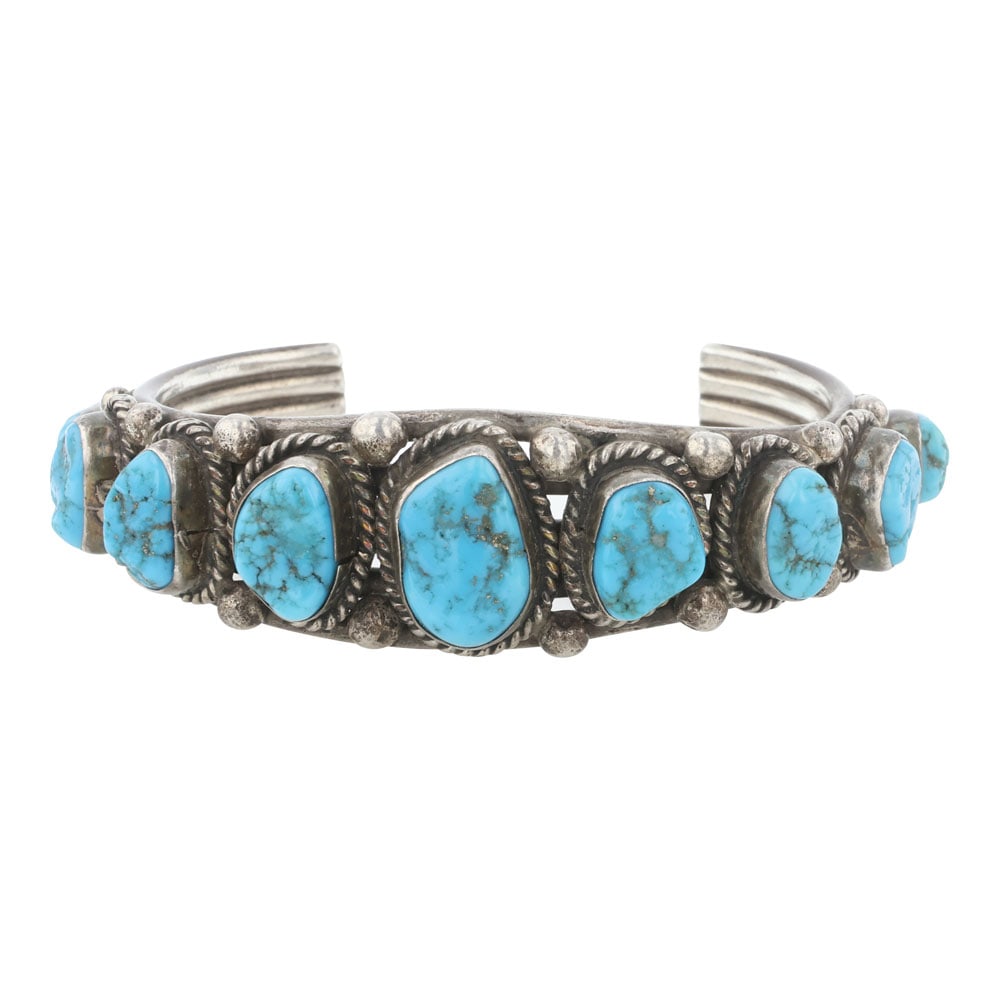 Vintage Navajo Sleeping Beauty Turquoise Graduated Cuff Bracelet: Sterling Silver | Genuine Sleeping Beauty Turquoise | Vintage Navajo Sleeping Beauty Turquoise Graduated Cuff Bracelet | Navajo Native American Southwest Indian Jewelry | Good (no breaks or damages) |