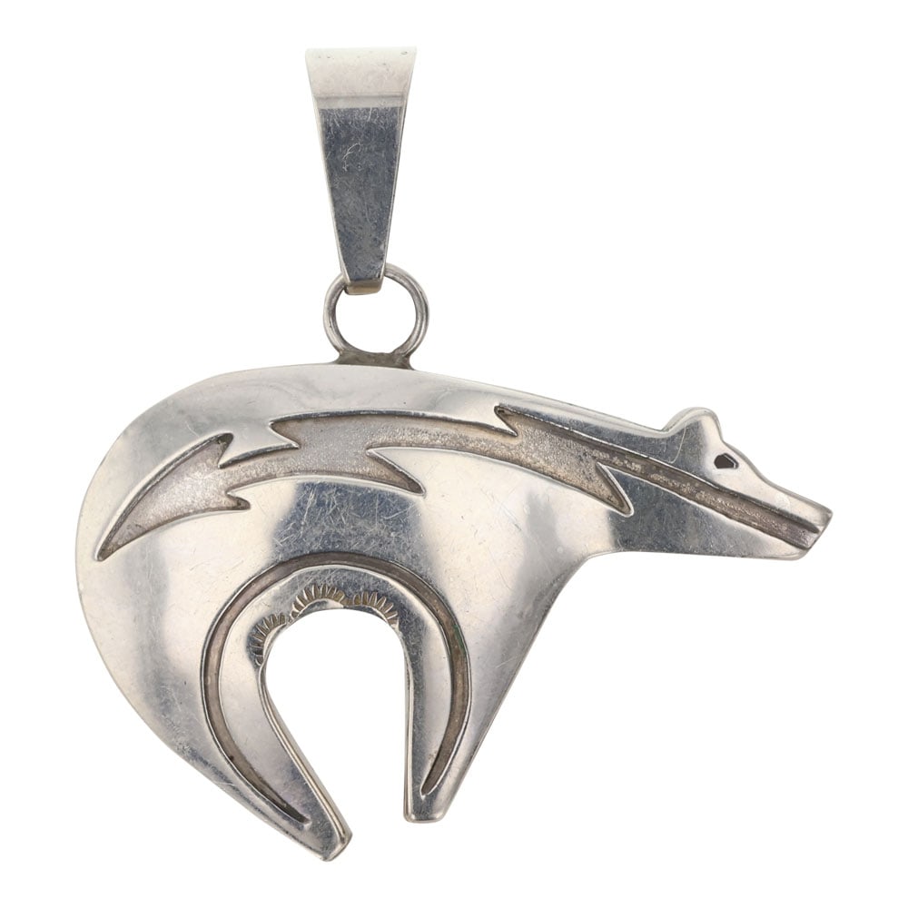 Navajo Plain Silver Bear Pendant: Sterling Silver | | Navajo Plain Silver Bear Pendant | Navajo Native American Southwest Indian Jewelry | Good (no breaks or damages) | Approximate Weight: 23 Grams | Pendant: 2.5" x 2.75" |