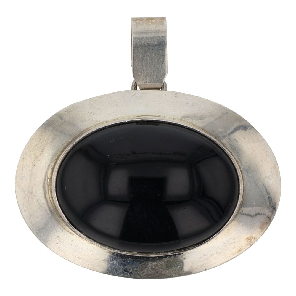 Navajo Black Onyx Pendant: Sterling Silver | Black Onyx | Navajo Black Onyx Pendant | Navajo Native American Southwest Indian Jewelry | Good (no breaks or damages) | Approximate Weight: 8 Grams | Pendant: 1.5" x 1.5" |