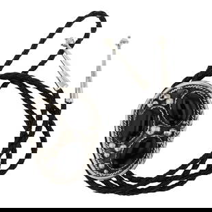 Navajo Black Onyx Bolo Tie: Sterling Silver | Genuine Black Onyx | Navajo Black Onyx Bolo Tie | Navajo Native American Southwest Indian Jewelry | Good (no breaks or damages) | Approximate Weight: 57 Grams | Bolo Tie: 21" length,