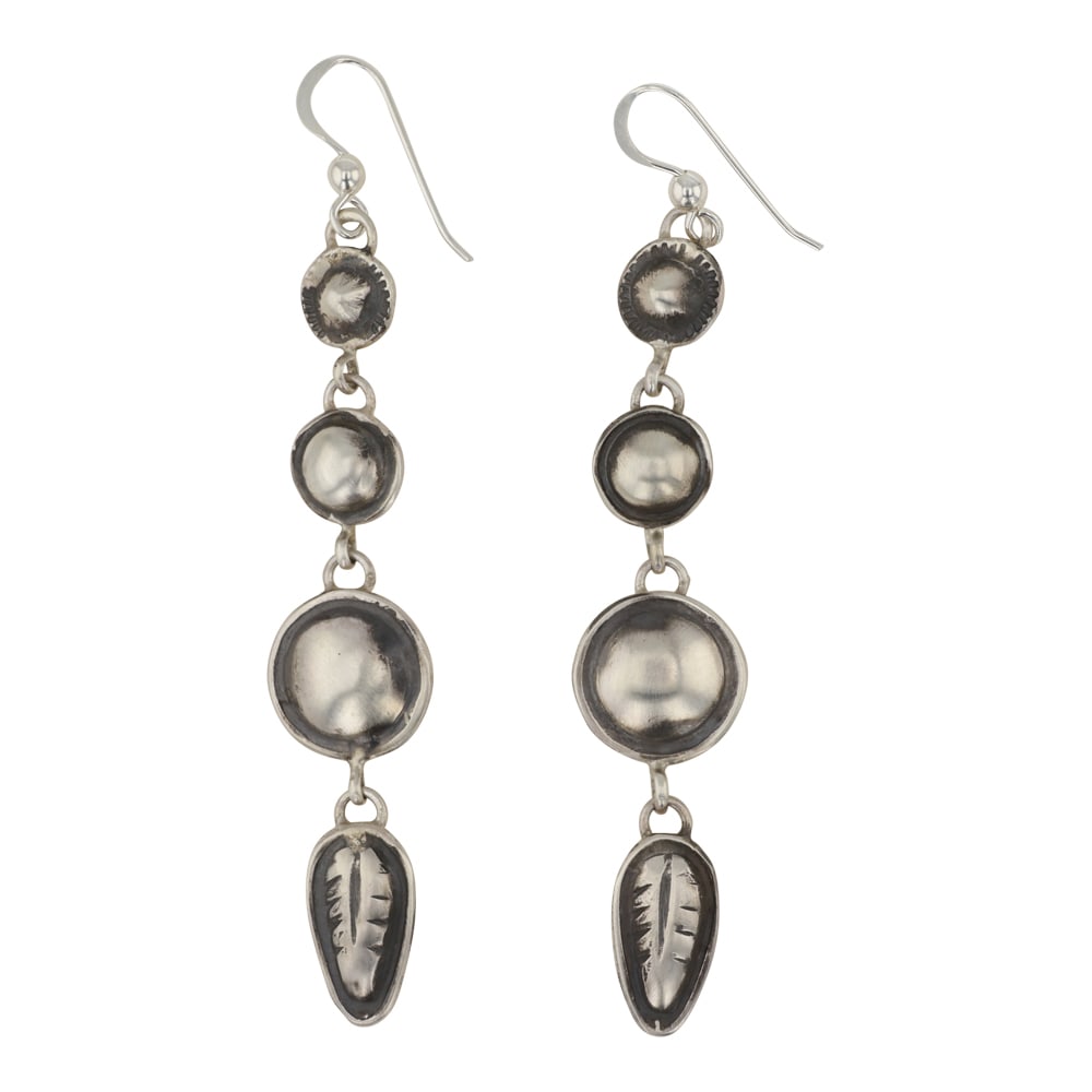 Dakotah Willie Navajo Bump out Silver Earrings: Sterling Silver | | Dakotah Willie Navajo Bump out Silver Earrings | Navajo Native American Southwest Indian Jewelry | Good (no breaks or damages) | Approximate Weight: 7 Grams | Earrings: .5" x 3" (e
