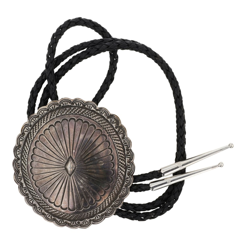 Vintage Navajo Stamp-Work Bolo Tie: Sterling Silver | | Vintage Navajo Stamp-Work Bolo Tie | Navajo Native American Southwest Indian Jewelry | Good (no breaks or damages) | Approximate Weight: 65 Grams | Bolo Tie: 18" length, 2.75" x 3"