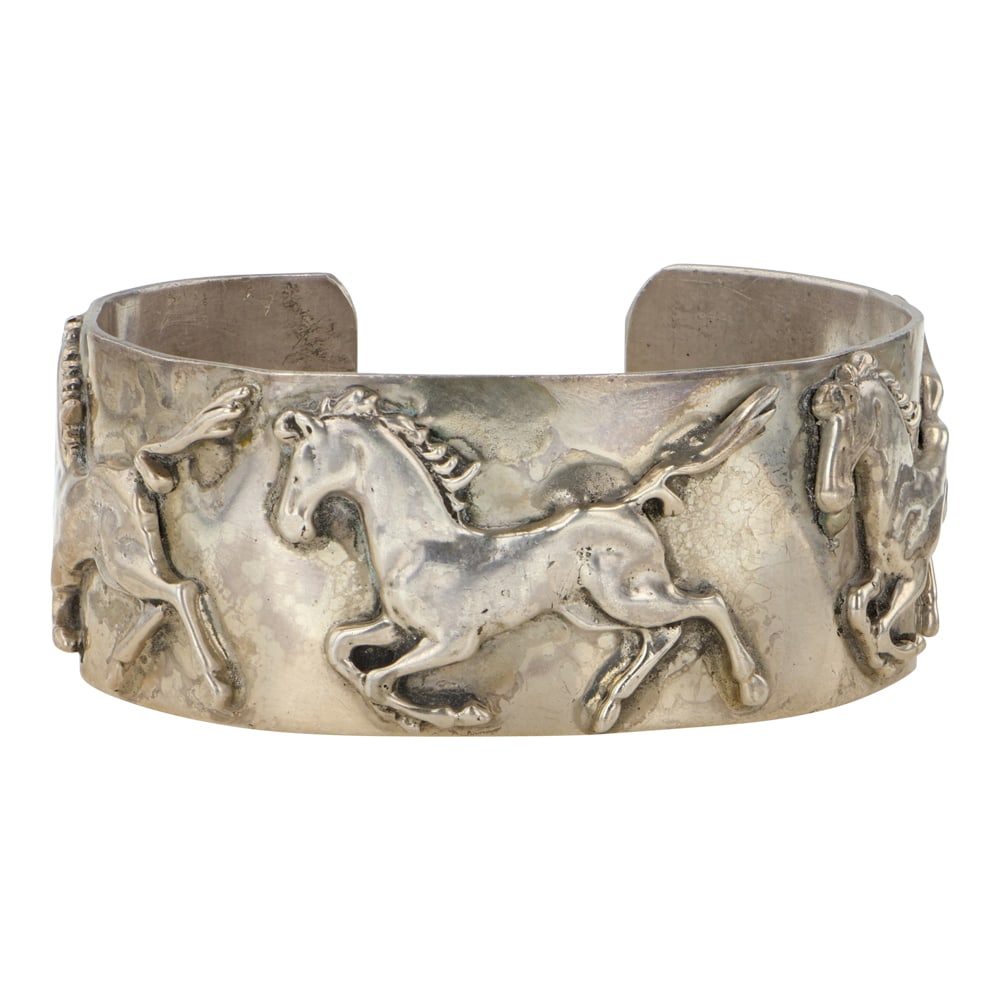 Vintage Navajo Running Horse Bracelet: Sterling Silver | | Vintage Navajo Running Horse Bracelet | Navajo Native American Southwest Indian Jewelry | Good (no breaks or damages) | Approximate Weight: 56 Grams | Bracelet: 5.75" inner, .75" g