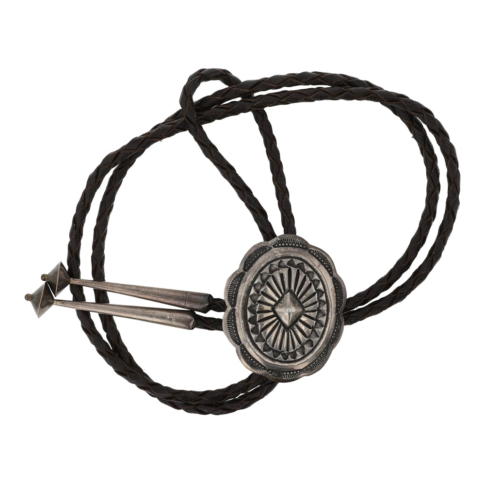 Vintage Navajo Stamp-Work Bolo Tie: Sterling Silver | | Vintage Navajo Stamp-Work Bolo Tie | Navajo Native American Southwest Indian Jewelry | Good (no breaks or damages) | Approximate Weight: 34 Grams | Bolo: 19" length, 2" x 1.75" len