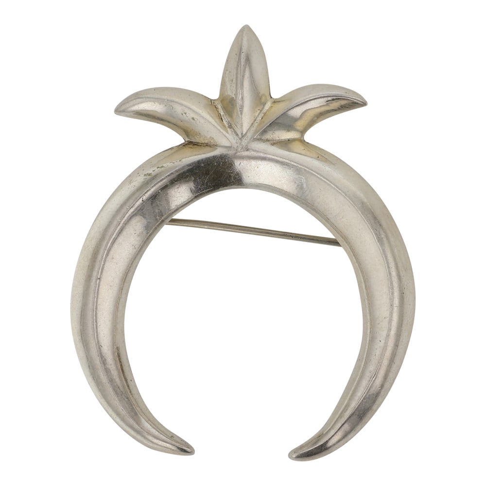 Navajo Plain Silver Sandcast Pin: Sterling Silver | | Navajo Plain Silver Sandcast Pin | Navajo Native American Southwest Indian Jewelry | Good (no breaks or damages) | Approximate Weight: 16 Grams | Pin/pendant: 2" x 1.5" | Signed: A