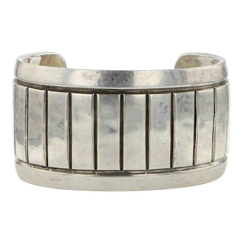 Michael Slim Navajo Wide Cuff Bracelet: Sterling Silver | | Michael Slim Navajo Wide Cuff Bracelet | Navajo Native American Southwest Indian Jewelry | Good (no breaks or damages) | Approximate Weight: 151 Grams | Bracelet: 6" inner, 1.5" ga