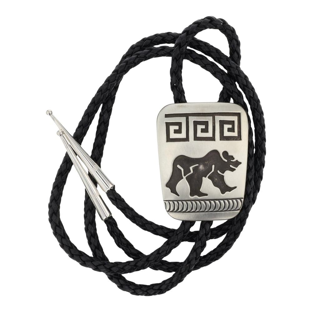 Rosco Scott Navajo Bear Bolo Tie: Sterling Silver | | Rosco Scott Navajo Bear Bolo Tie | Navajo Native American Southwest Indian Jewelry | Good (no breaks or damages) | Approximate Weight: 37 Grams | Bolo: 19" length, 2" x 1.5" pendan