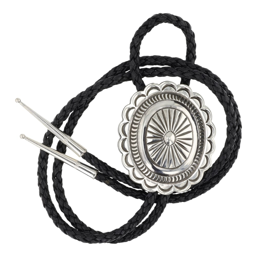 Navajo Plain Silver Stamp Work Bolo Tie: Sterling Silver | | Navajo Plain Silver Stamp Work Bolo Tie | Navajo Native American Southwest Indian Jewelry | Good (no breaks or damages) | Approximate Weight: 33 Grams | Bolo: 19" length, 2.25" x 2