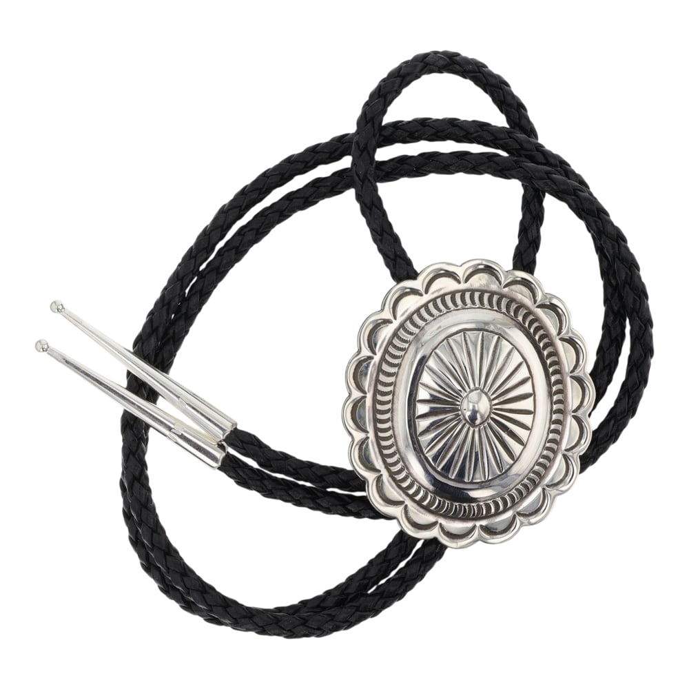 Navajo Stamp Work Bolo Tie: Sterling Silver | | Navajo Stamp Work Bolo Tie | Navajo Native American Southwest Indian Jewelry | Good (no breaks or damages) | Approximate Weight: 33 Grams | Bolo: 19" length, 2.25" x 2" pendant