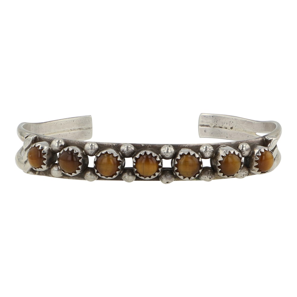 Navajo Tiger's Eye Cuff Bracelet: Sterling Silver | Genuine Tiger's Eye | Navajo Tiger's Eye Cuff Bracelet | Navajo Native American Southwest Indian Jewelry | Good (no breaks or damages) | Approximate Weight: 16 Grams | Bracelet: 5.5"
