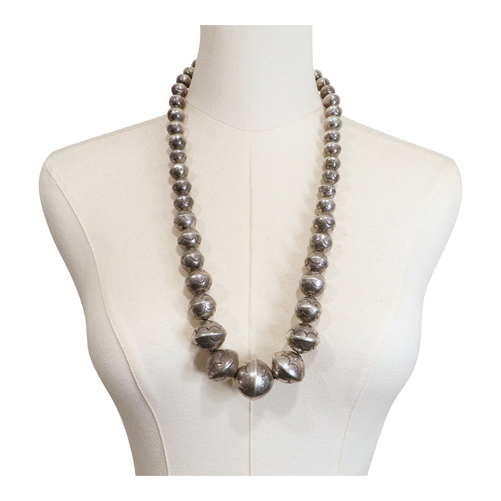 Vintage Navajo Stamp Work Hand Made Beads Graduated Necklace: Sterling Silver | | Vintage Navajo Stamp Work Hand Made Beads Graduated Necklace | Navajo Native American Southwest Indian Jewelry | Good (no breaks or damages) | Approximate Weight: 165 Grams |