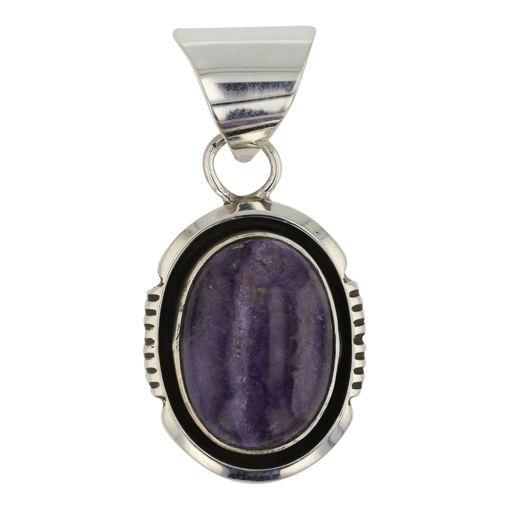 Navajo Charoite Pendant: Sterling Silver | Genuine Charoite | Navajo Charoite Pendant | Navajo Native American Southwest Indian Jewelry | Good (no breaks or damages) | Approximate Weight: 5 Grams | Pendant: 1.5" x .75" |