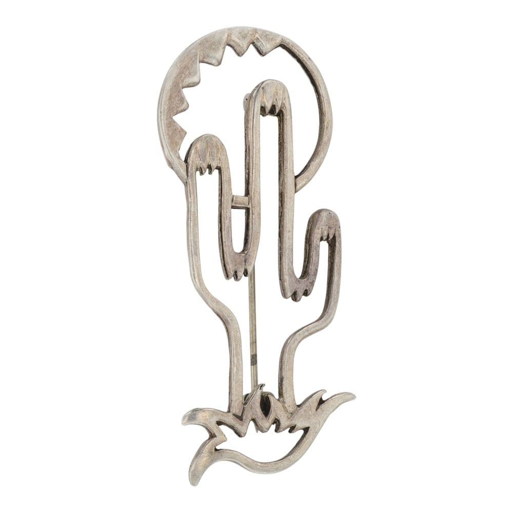 Vintage Navajo Plain Silver Cactus Pin: Sterling Silver | | Vintage Navajo Plain Silver Cactus Pin | Navajo Native American Southwest Indian Jewelry | Good (no breaks or damages) | Approximate Weight: 7 Grams | Pin: 2.5" x 1" |