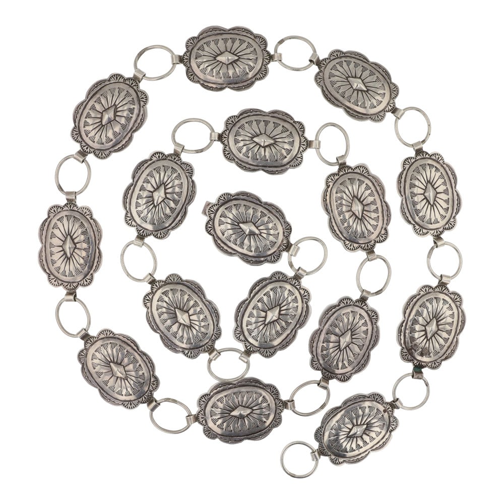 Larson Blackgoat (1957-2003) Navajo Stamp-Work Link Concho Belt: Sterling Silver | | Larson Blackgoat (1957-2003) Navajo Stamp-Work Link Concho Belt | Navajo Native American Southwest Indian Jewelry | Good (no breaks or damages) | Approximate Weight: 94 Grams | Bel