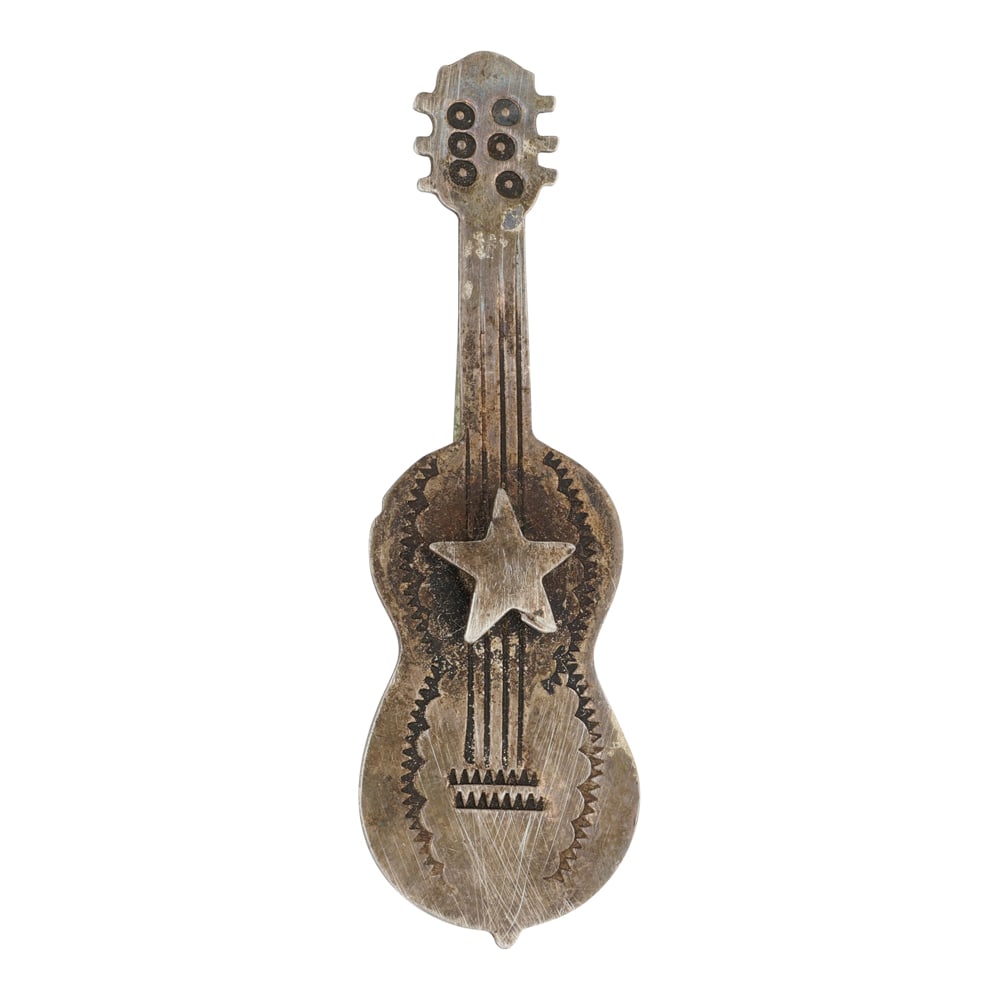 Gary Anderson Navajo Guitar Pin: Sterling Silver | | Gary Anderson Navajo Guitar Pin | Navajo Native American Southwest Indian Jewelry | Good (no breaks or damages) | Approximate Weight:?6 Grams | Pin: 2.5" x .75" |